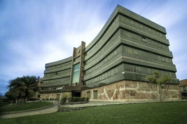 	Edificio de los servicios centrales de Caja Rural Castilla-La Mancha, en Toledo